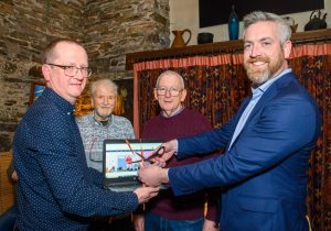 Minister of State at the Department of Housing, Local Government and Heritage Christopher O’Sullivan TD officially launched the Kinsale Cultural and Heritage Society website, www.kinsaleculturalandheritagesociety.com, last week at their annual table quiz. Pictured at the launch with the minister were JJ Hurley, Chairman; Terry Connolly, President and Padraig Walsh, Vice-Chairman. Picture. John Allen